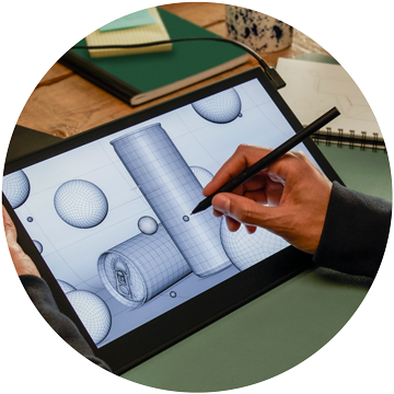 Person drawing shapes on a Wacom Movink pen display